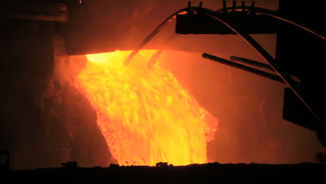 Molten-metal-pouring-out-of-furnace.-Liquid-metal-from-blast-furnace
